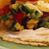 Build Your Own Corn Tortilla Tacos (2) · 2 corn tortilla tacos. Choice of protein. Two toppings. Garnishes and sauce.