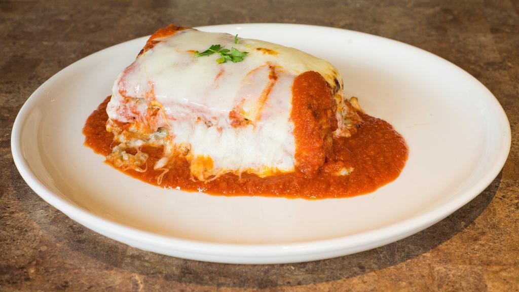 Meat Lasagna · Original triple layered lasagna with tomato sauce and mozzarella cheese.