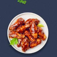 Bbq Brawl Chicken Wings · Fresh chicken wings breaded, fried until golden brown, and tossed in barbecue sauce. Served ...