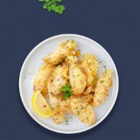 Go Go Garlic Parmesan Wings · Fresh chicken wings breaded, fried until golden brown, and tossed in garlic and parmesan. Se...