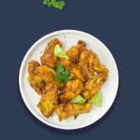 Life Gives You Lemonade Wings · Fresh chicken wings breaded, fried until golden brown, and tossed in lemon pepper sauce. Ser...