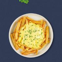 Cheese Bliss Fries · Idaho potato fries cooked until golden brown and garnished with salt and melted cheddar chee...