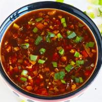 Veg Hot & Sour Soup · Thick soup with julienne vegetables.