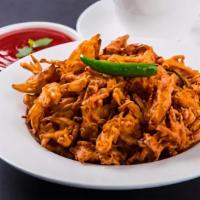 Veg/Onion Pakora · Slices of vegetables/onions mixed with spicy chickpea flour and deep-fried.