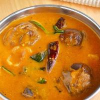 Bagara Baingan · A popular Hyderabadi dish made with eggplants cooked in a rich masala curry.