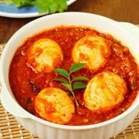 Madrasi Egg Curry · Boiled eggs cooked in freshly ground spices with chettinad gravy.