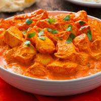 Chicken Tikka Masala · Boneless grilled chicken cooked with tomato, special spices, and touch of cream.