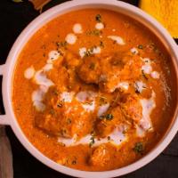 Butter Chicken · Chicken sauteed in butter and blend of spices.