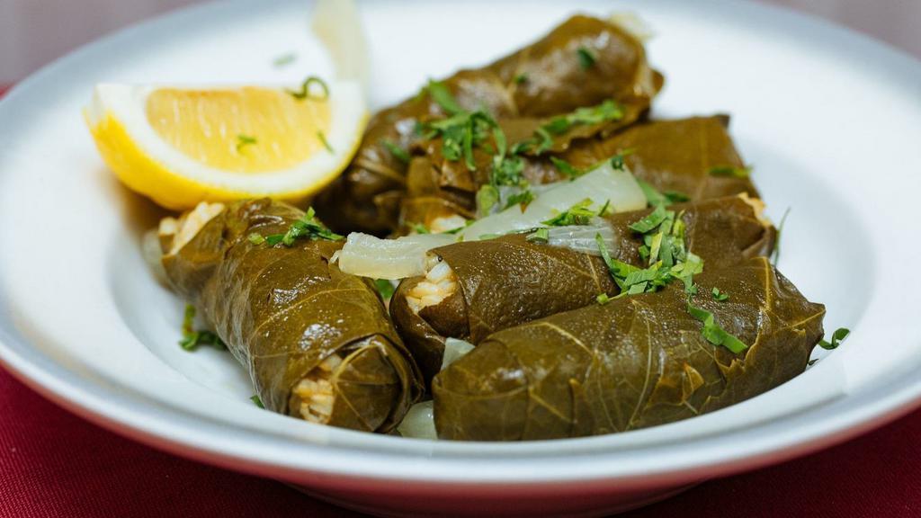 Grape Leaves · Vine leaves stuffed with rice and vegetables.