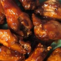 Bbq Wings · Tossed in our homemade BBQ sauce!