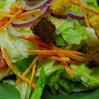 Garden Salad · A simple side salad. Just lettuce, tomatoes, carrots, red onions and croutons. Served with d...