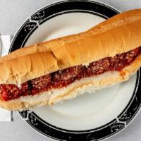 Meatball Sub · Topped with home-made meatballs and classic cheese.