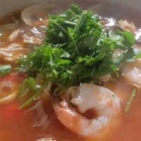 Pho Sate · Spicy. Spicy beef noodle soup combined with sliced rare steak, well done flank, beef ball, w...