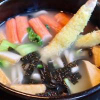 Udon 乌冬面 · Choice of shrimp tempura, chicken or beef with fish tofu, crab meat, seaweed and Shanghai bo...