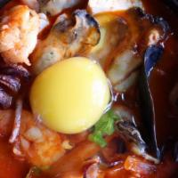 Seafood Dubu Soup （Spicy）海鲜豆腐煲（辣） · Spicy. Korean Soft Tofu Stew with Oyster, Shrimp, Mussel, Clam, come with Salad, Rice and Eg...
