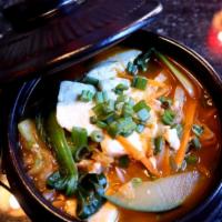 Vegetable Dubu Soup（Spicy） 青菜豆腐煲（辣） · Spicy. Korean Soft Tofu Stew with Pork Potato, Carrot, Mushroom, come with Salad, Rice and E...