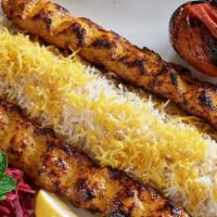 Chicken Koobideh · Two skewered ground chicken, mixed w/ saffron and grilled on open fire. Include Plain Basmat...