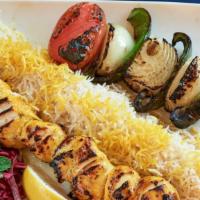 Shiraz Loghmeh · Fillet of chicken marinated in saffron and lemon juice, grilled with green pepper, Onion and...