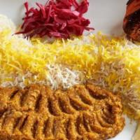 Mirza Ghassemi Plate · Mixture of sautéed eggplant, tomato, paste, garlic & egg, served w/ rice & grilled tomato. I...