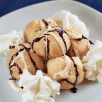 Cream Puffs · Light, airy, and simply scrumptious Choux pastry filled with whipped cream.