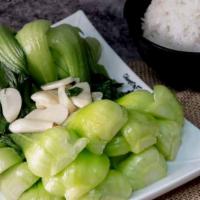 Bok Choy Stir-Fried W. Sliced Garlic 蒜炒上海青 · 蒜炒上海青 / stir fried. comes with a bowl of white rice.