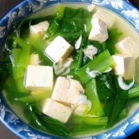 Bok Choy Tofu Soup 青菜豆腐汤 · 青菜豆腐汤 / chicken broth-based soup with sliced tofu and bok choy.