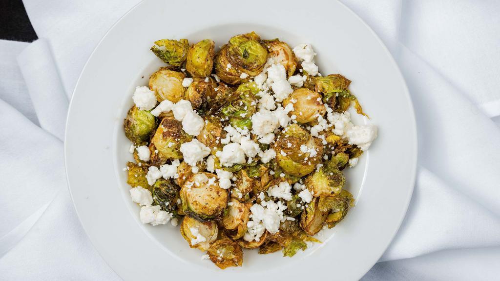 Crispy Brussel Sprouts · Smoked Paprika with feta cheese, salt, pepper, & garlic