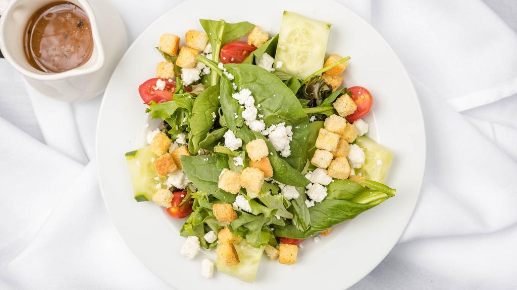 Fattoush Salad · Cucumbers, tomato, parsley, onions, feta cheese, and croutons with
balsamic vinaigrette