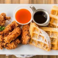 Moroccan Chicken & Waffles Brunch · Served with warm maple syrup and powdered sugar.