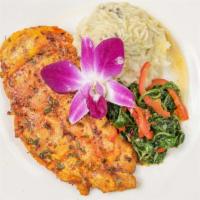 Lebanese Chicken Dinner · Marinated chicken breast served over rice or garlic mashed potatoes
with spinach