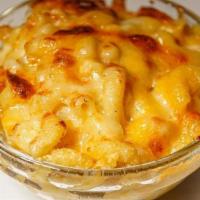 Side Mac & Cheese · Elbow Noodles with our Cheddar Cheese blend. Cannot Be Made Gluten-Free or Vegan.