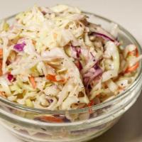 Coleslaw · Finely Shredded White and Purple Cabbage and Carrots with a Creamy Dressing