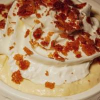 Banana Pudding · Creamy Banana Pudding made with Nilla Wafers and Topped with Whipped Cream and Graham Cracke...