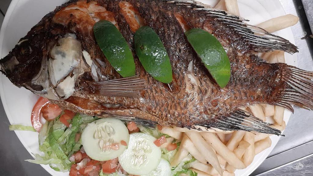 Mojorra Frita · Fried tilapia. Served with salad, French fries and tortillas.