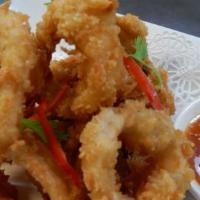 Fried Calamari · Calamari fried with a Thai style seasoning and served with chili lime dipping sauce.