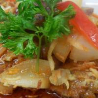 Mussamun Chicken · Chicken, potatoes, peanuts, and onion, in a mussamun curry topped with crispy onions. Served...