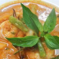 Pumpkin Red Curry With Shrimp · Shrimp, Chinese pumpkin, red peppers, and sweet basil in red curry sauce. Served with brown ...
