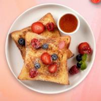 Straw Pieces French Toasts Platter  · 2 fluffy strawberry french toasts with choice of meat, eggs and cheese!