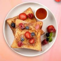 Blueberry Bits French Toasts Platter  · 2 fluffy blueberry french toasts with choice of meat, eggs and cheese!