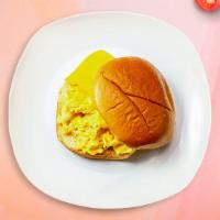 E&C Breakfast Sandwich · A sandwich of toasted breads containing egg and cheese with toppings.
