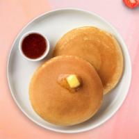 2 Pancakes  · Fluffy pancakes cooked with care and love served with butter and maple syrup. Served in pairs.