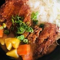 Chicken Katsu Curry · Contains egg. Beaded fried chicken with carrot, potato, onion, sliced cabbage, and scallion.