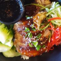 Roasted Duck Rice Bowl · Roasted duck, bok choy and cucumber pickled ginger sprinkled with sesame seeds and scallions...