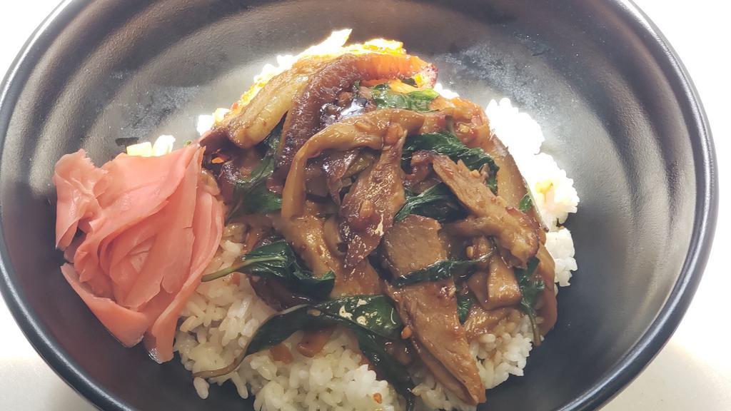 Spicy Cha-Shu Rice Bowl · Sauteed cha-shu (marinated braised pork belly) with spicy garlic sauce, bamboo, wood ear mushroom and basil. Topped with pickled ginger.