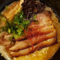 Tonkotsu Ramen · Contains egg and dairy. Pork broth, cha-shu pork, menma (Japanese bamboo), nori, wood ear mu...