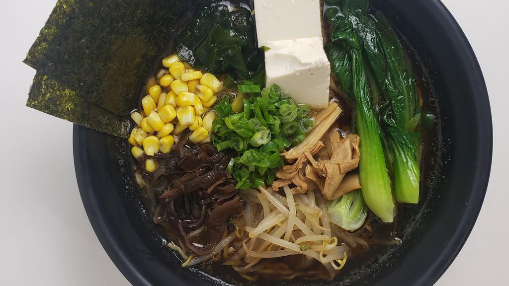 Yasai Ramen · Contains egg. Veggie broth, steamed tofu, wood ear mushroom, bok choy, wakame seaweed, sweet corn, memma (Japanese bamboo), bean sprouts, nori and scallions.