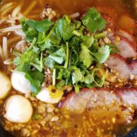 Tom Yum Noodle Soup · Contains peanuts. Thai style hot and sour soup with rice noodle, roasted pork, home style gr...