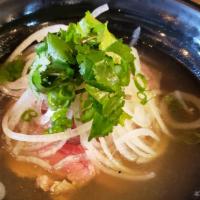 Pho Tai · Beef noodle soup with rare steak in beef broth. Served with fresh bean sprouts, basil leaves...