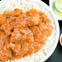 Chicken Vindaloo · Spicy. Boneless chicken cooked with potatoes in a tangy tomato sauce.