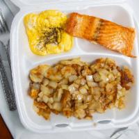 Grilled Salmon Fish Platter · Served with two eggs, home fries or grits, buttered toast, grape jelly or strawberry jam.